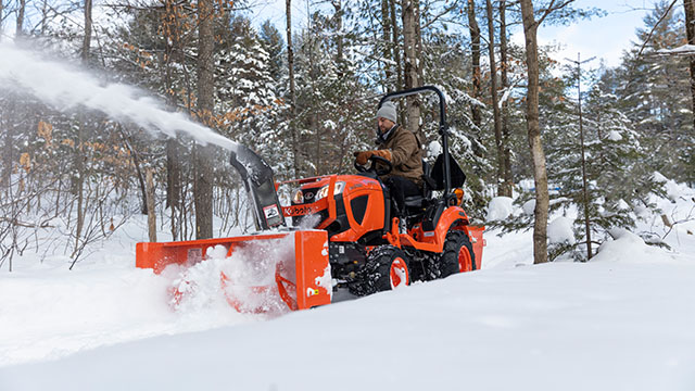 Kubota BX80 tractor with snow blower attachment